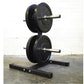 Warrior Olympic weight plate tree with two black plates and blue trim on metal bar, mounted on black steel base