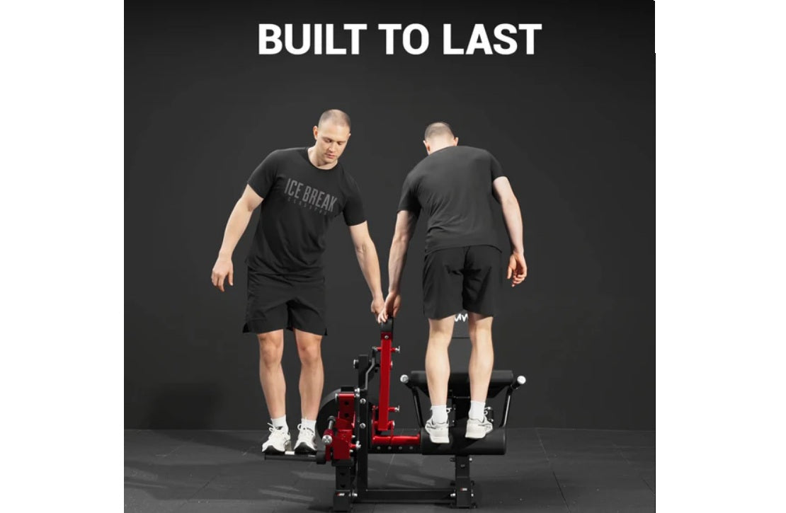Two men wearing black t-shirts and shorts demonstrate the Warrior Signature Commercial Plate-Loaded Leg Extension/Prone Leg C