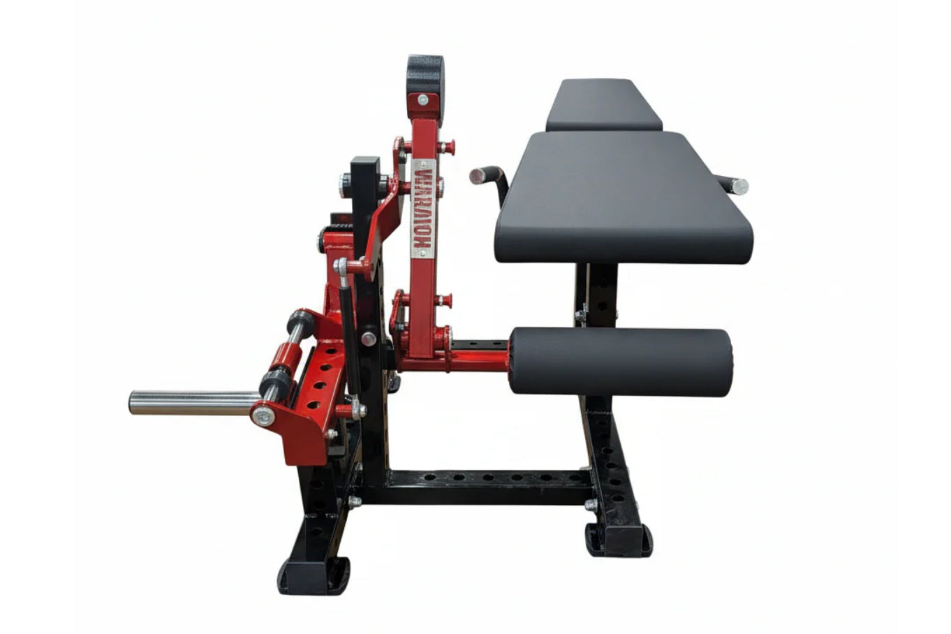 Warrior Signature commercial leg extension and prone leg curl machine with red frame, black padding, and steel components on 