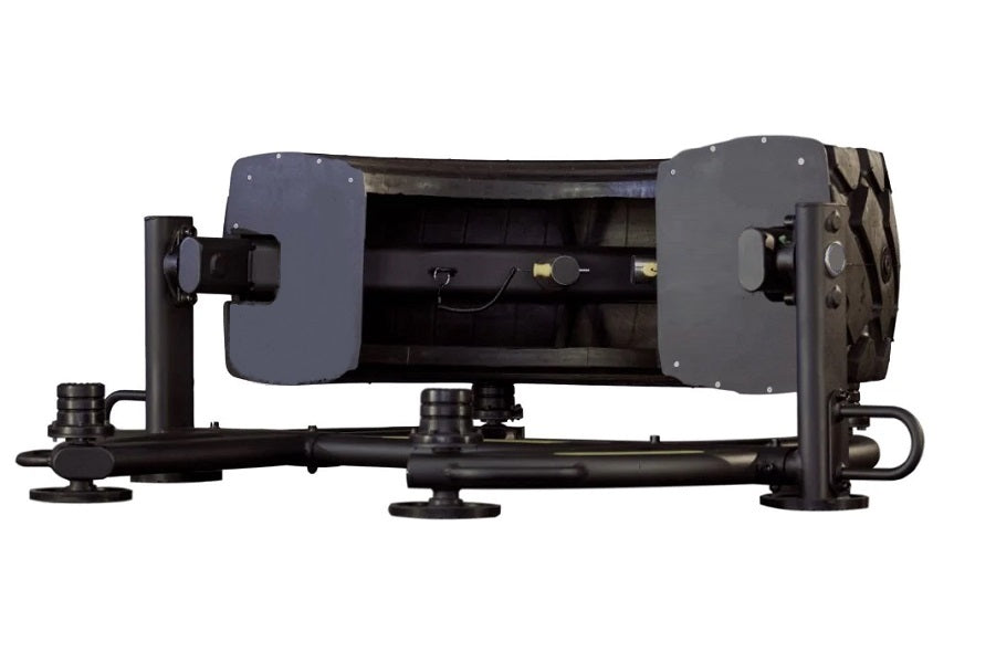 Warrior 180 Tire Flip XL exercise machine with black frame, gray end plates, and horizontal rotating drum on white background