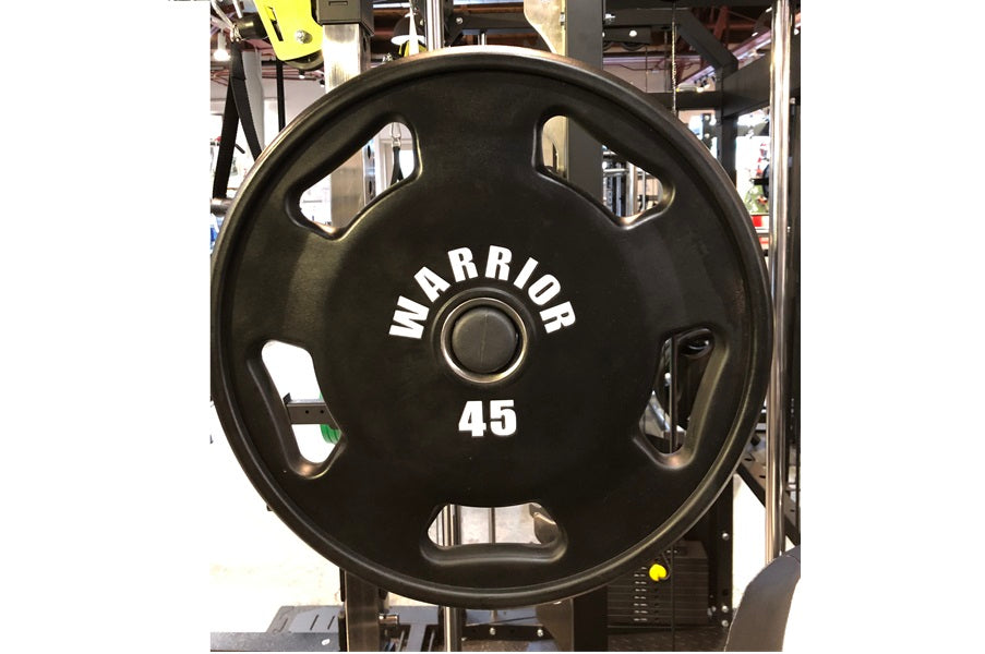 Black rubber Olympic weight plate with "Warrior" branding and "45" marking, dual handles, displayed front-facing