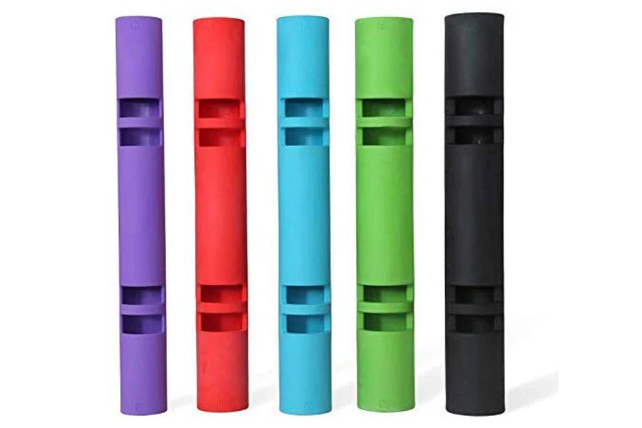 Five cylindrical foam rollers in purple, red, cyan, green, and black with grip bands, displayed in a row on white background