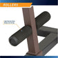 High-density foam rollers for sit ups on brown power tower frame, black cylindrical foam with gray end caps