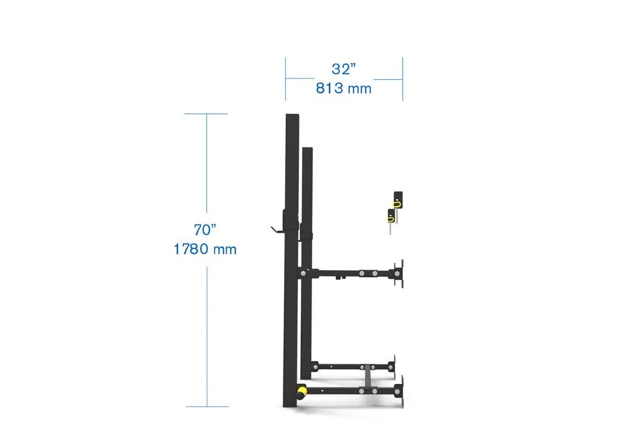 Black wall-mounted fold-up squat rack with adjustable arms and safety bars, 70 inches tall by 32 inches wide, shown with dime