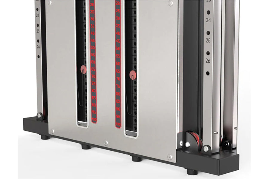 Warrior wall-mounted cable pulley home gym system with dual stacks, featuring red numbered weight indicators and black base o