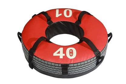 Red and black 40kg workout tire with rope handles on white background