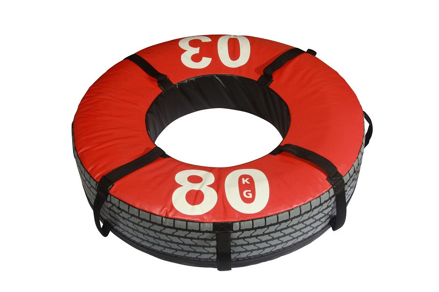 Red and black 80kg weighted tire with handles, viewed from above on white background