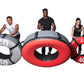 Three weighted exercise tires in gray 60 lb, red 90 lb, and red 40 lb sizes, each held by a model demonstrating use on white 