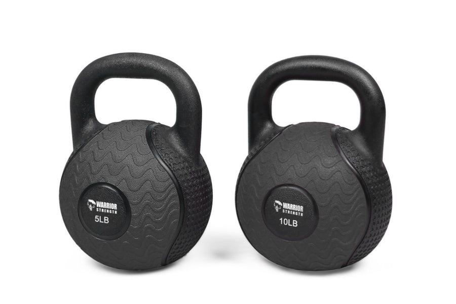 Two black rubber kettlebells with textured surfaces and looped handles, labeled 5LB and 10LB, displayed on white background