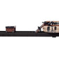 WaterRower Heritage rowing machine with black base, wooden frame, water tank, and resistance mechanism on white background