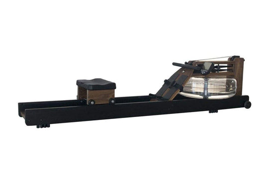 WaterRower Heritage rowing machine with black frame, wooden seat and footplate, and water resistance tank on white background