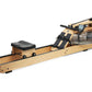 Water rowing machine with natural oak wood frame, black seat and handles, digital monitor, and transparent water resistance t