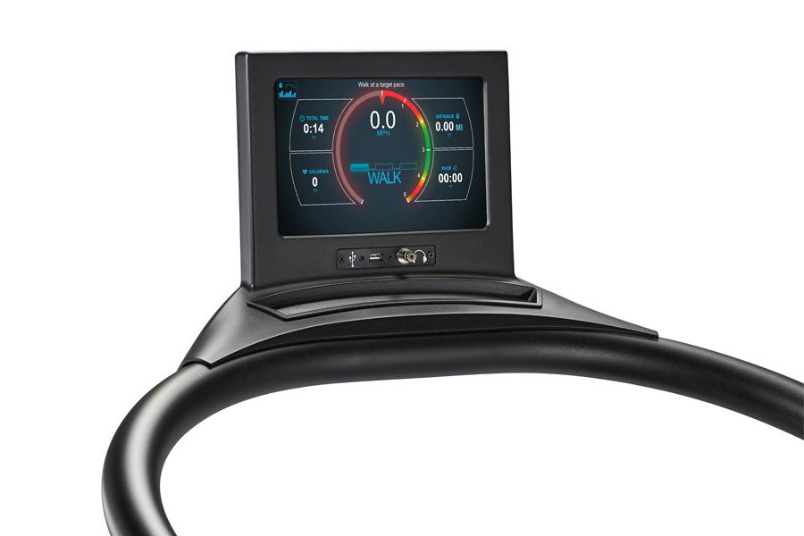 Black curved treadmill with digital display screen showing workout metrics including pace, calories, and walk mode indicator