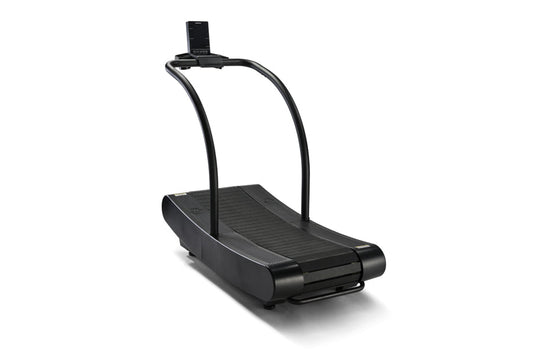 Black curved manual treadmill with curved running belt and dual handles on white background
