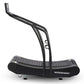 Woodway Curve black manual treadmill with curved running surface and angled handlebar on white background