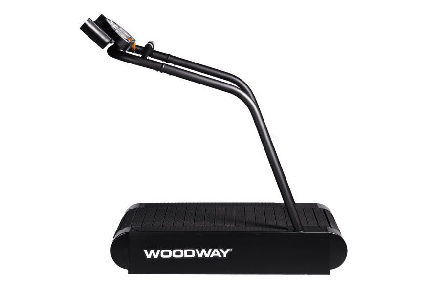 Black Woodway treadmill running deck with attached power cord and connector on white background