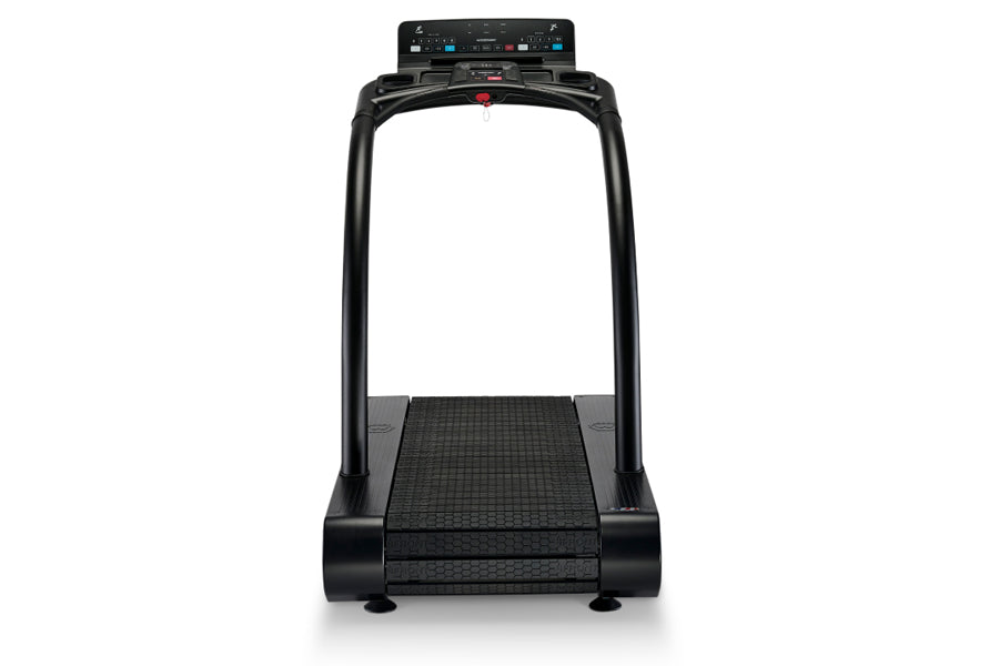 Black motorized treadmill with digital console, textured running belt, and curved handrails on white background